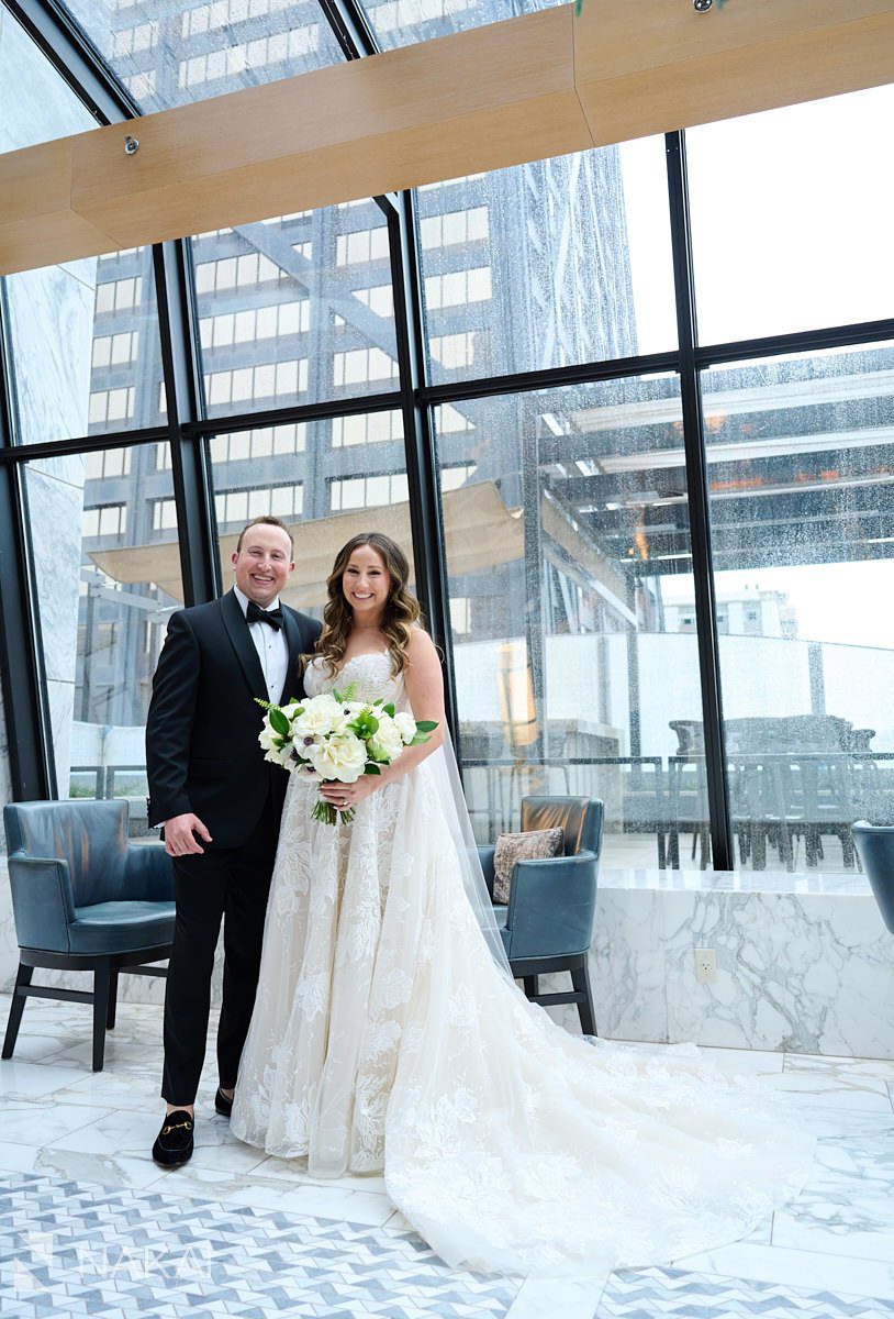 chicago ritz carlton wedding photos indoor lobby bride groom