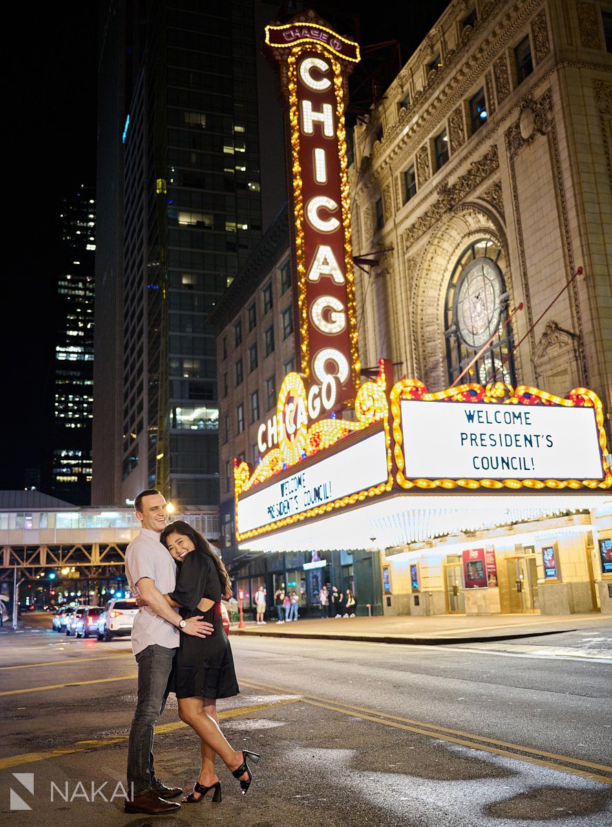chicago riverwalk proposal photos at night Chicago Theatre marquee