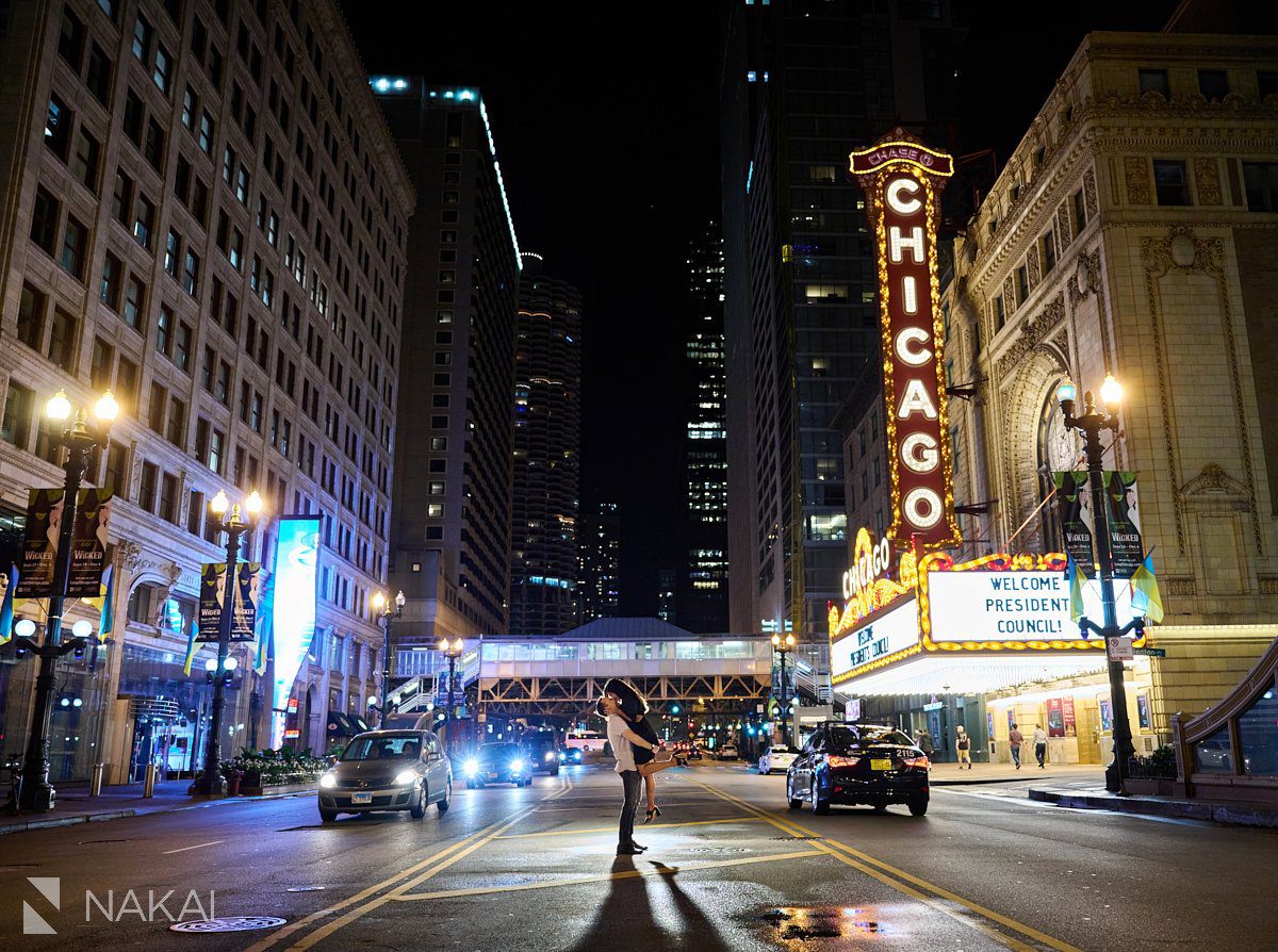 chicago riverwalk proposal photos at night Chicago Theatre sign