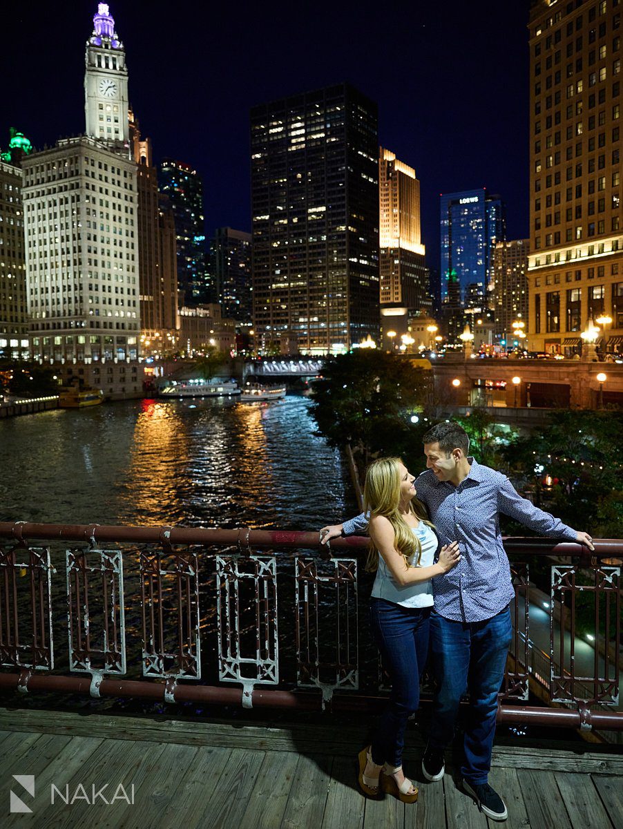 night time chicago engagement photos riverwalk