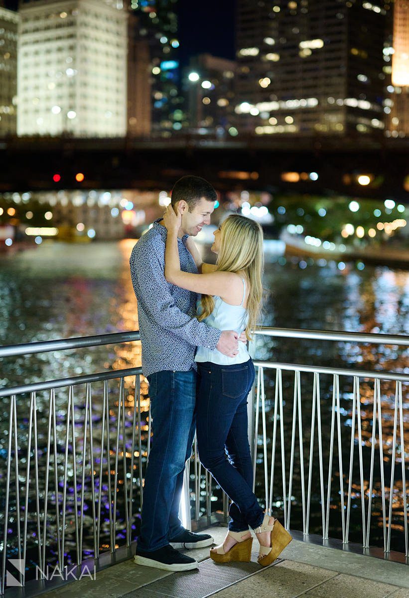 night time chicago engagement photos riverwalk