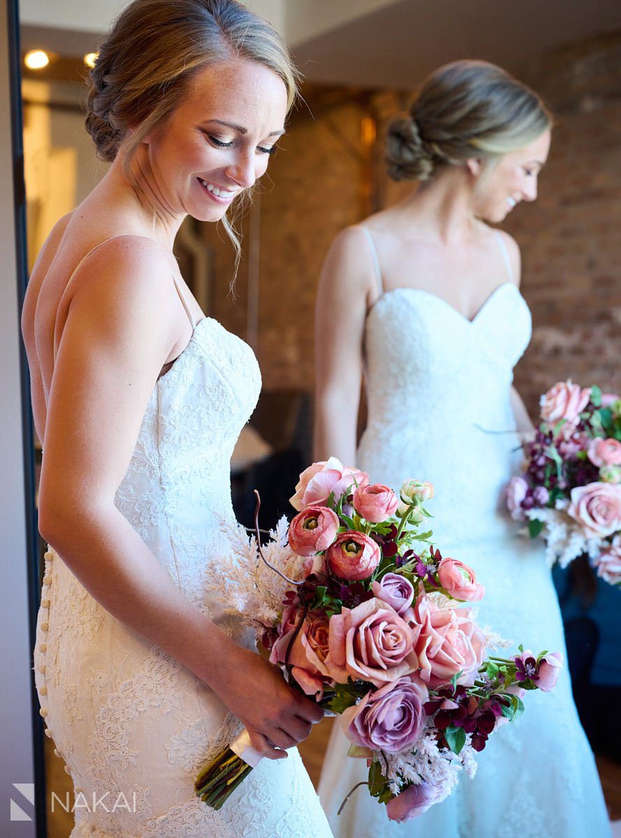 lacuna lofts wedding photos getting ready mirror flowers