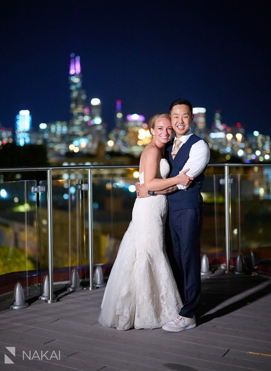 lacuna lofts wedding photos night time rooftop Chicago skyline