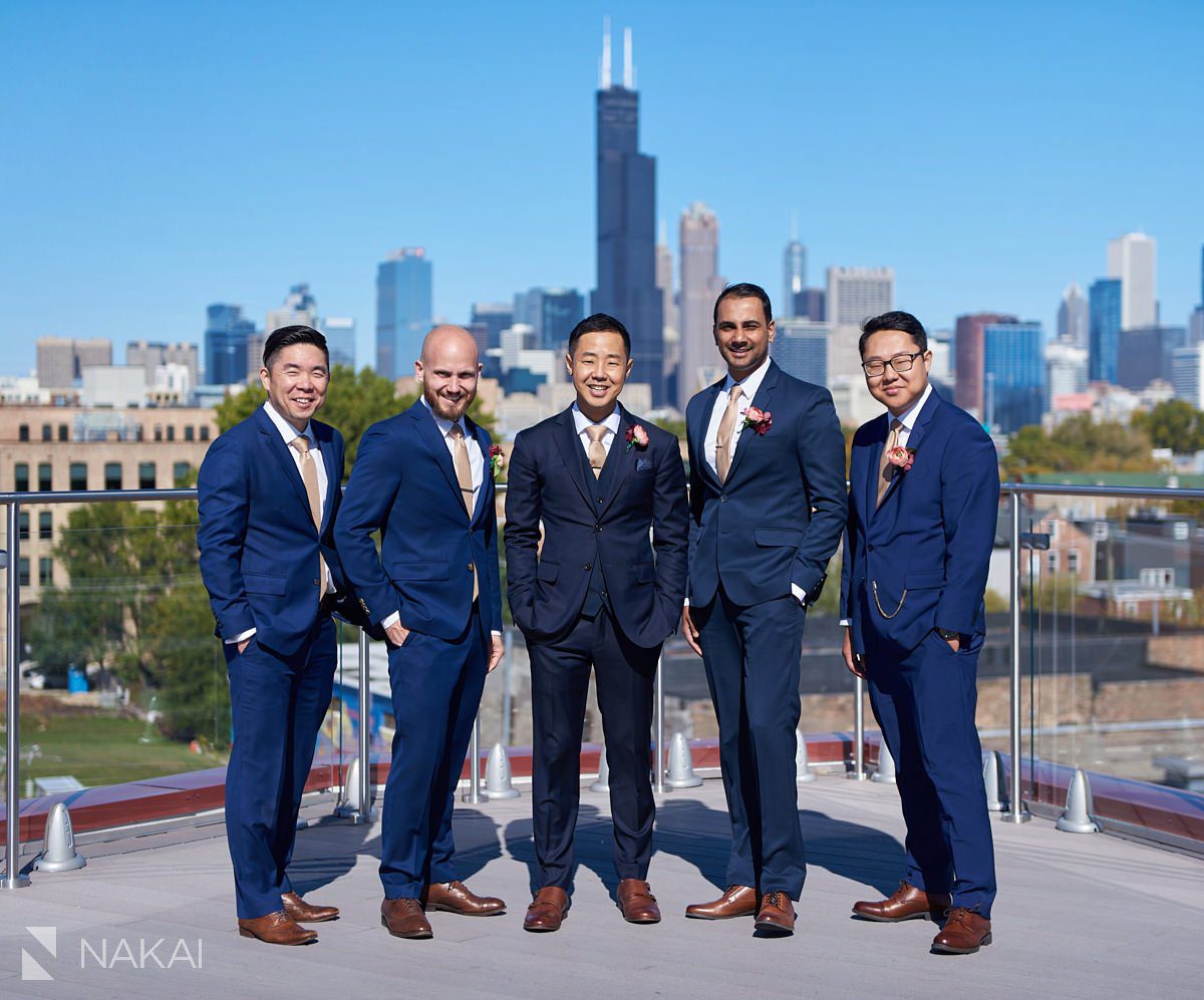 lacuna lofts wedding photos rooftop chicago skyline groomsmen