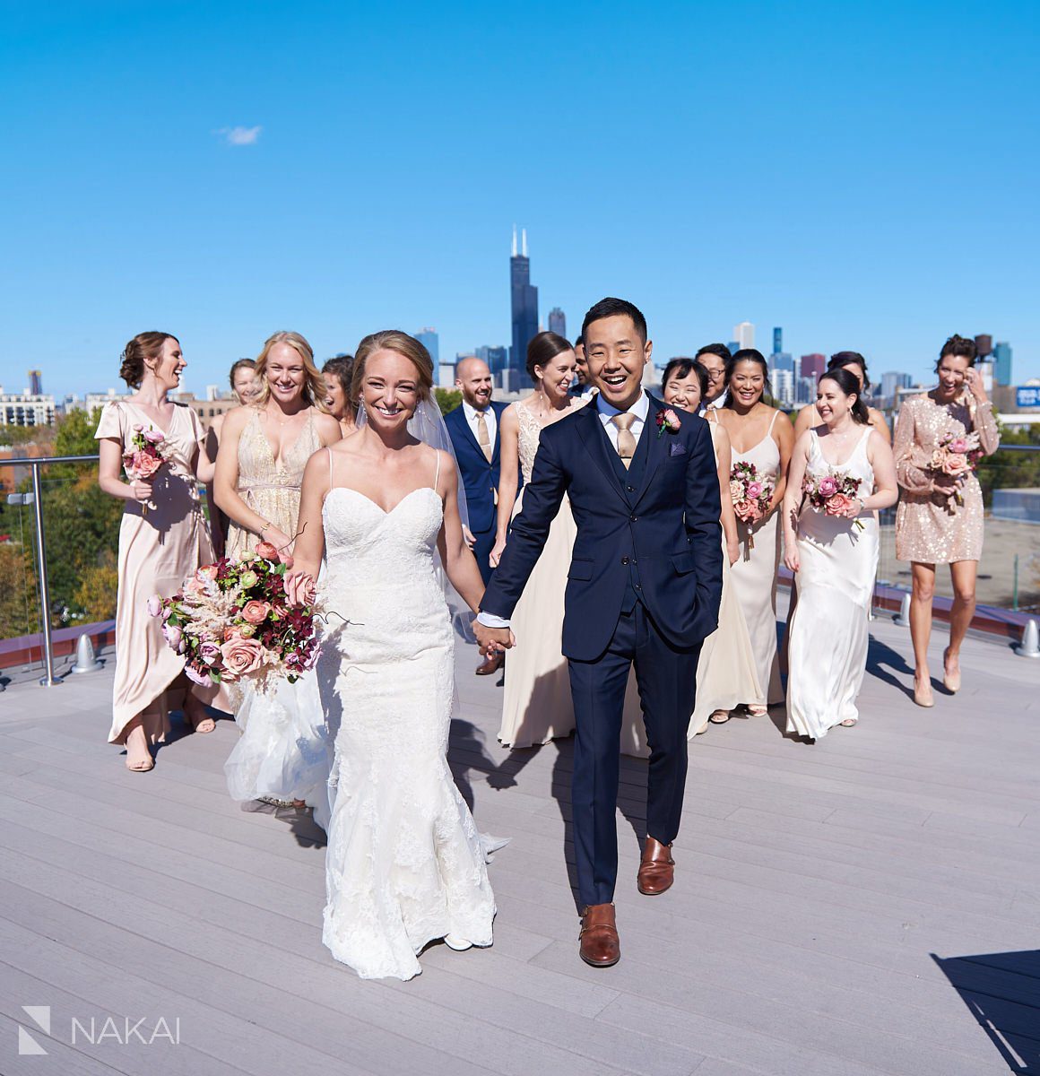 lacuna lofts wedding photos rooftop chicago skyline bridal party