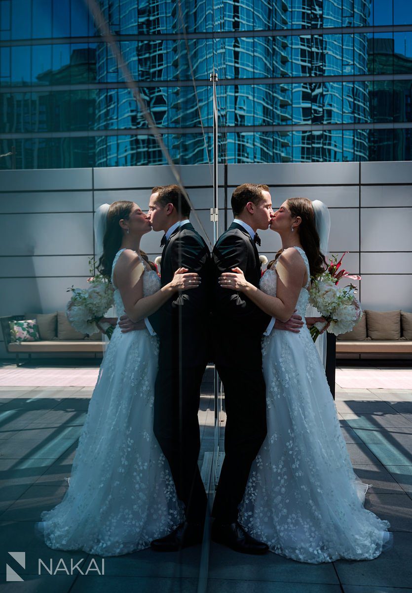 Loews chicago hotel wedding photos rooftop terrace bride and groom reflection