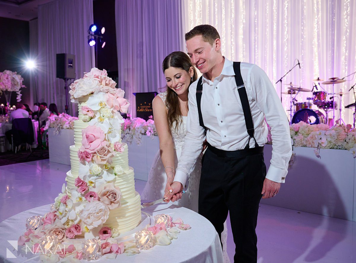 Loews chicago hotel wedding photos reception cake cutting 