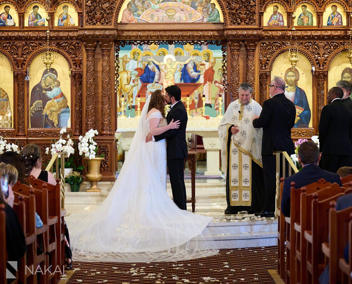 chicago greek wedding photos kiss ceremony bride and groom