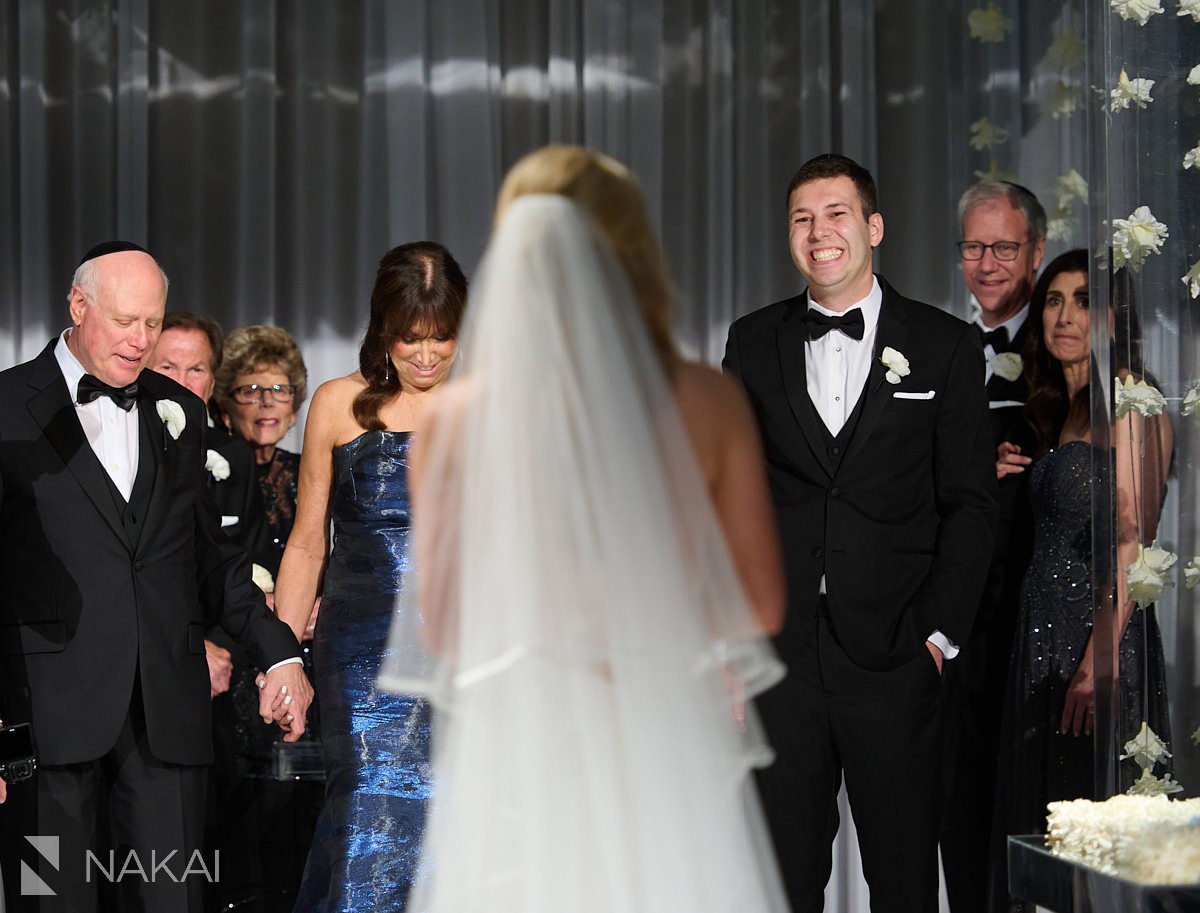 loews chicago wedding photos ceremony bride walking down aisle