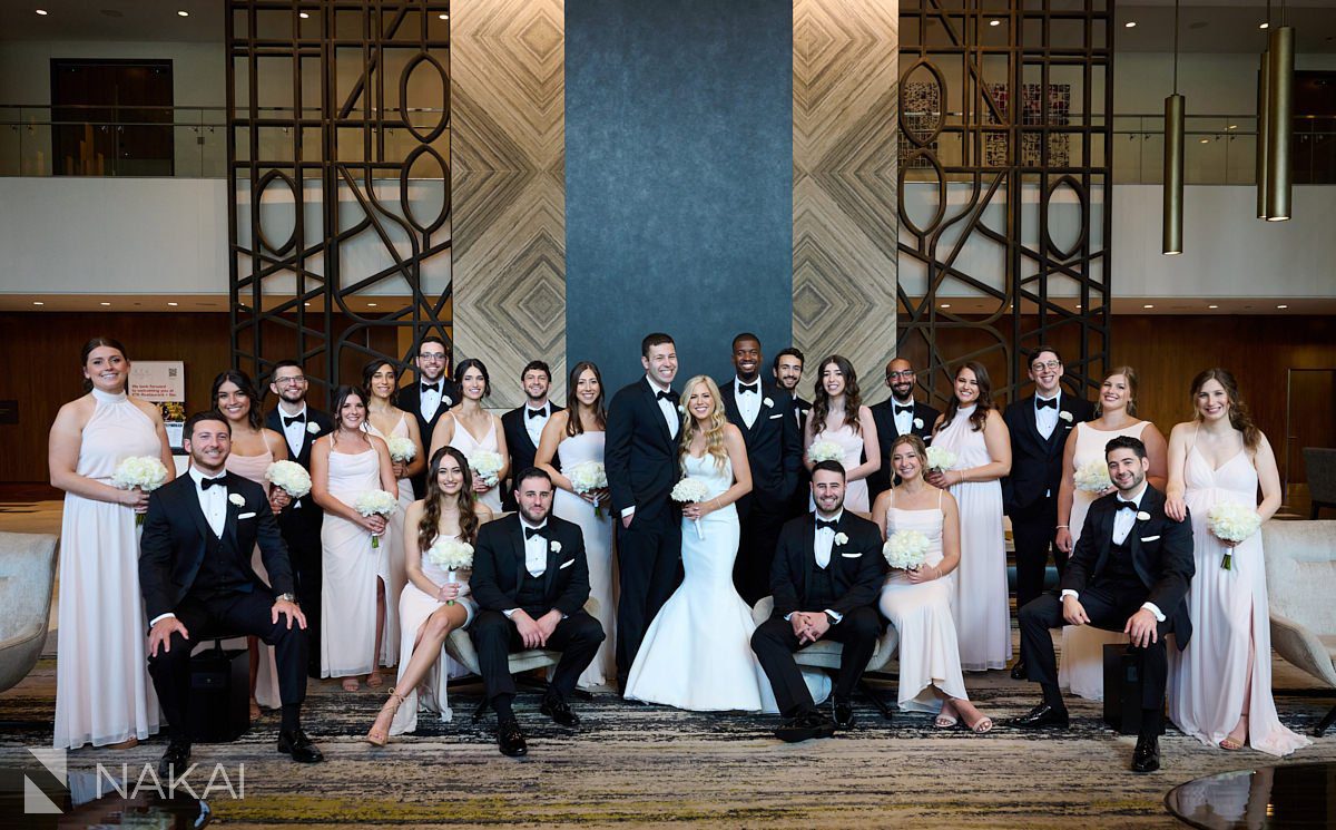 loews chicago wedding photos bridal party lobby group