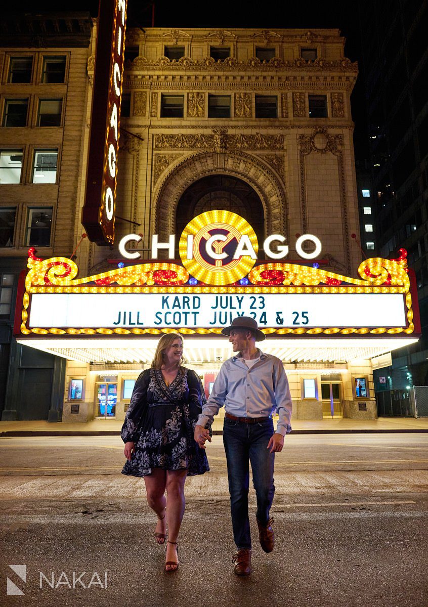 nighttime Chicago engagement photos theatre sign