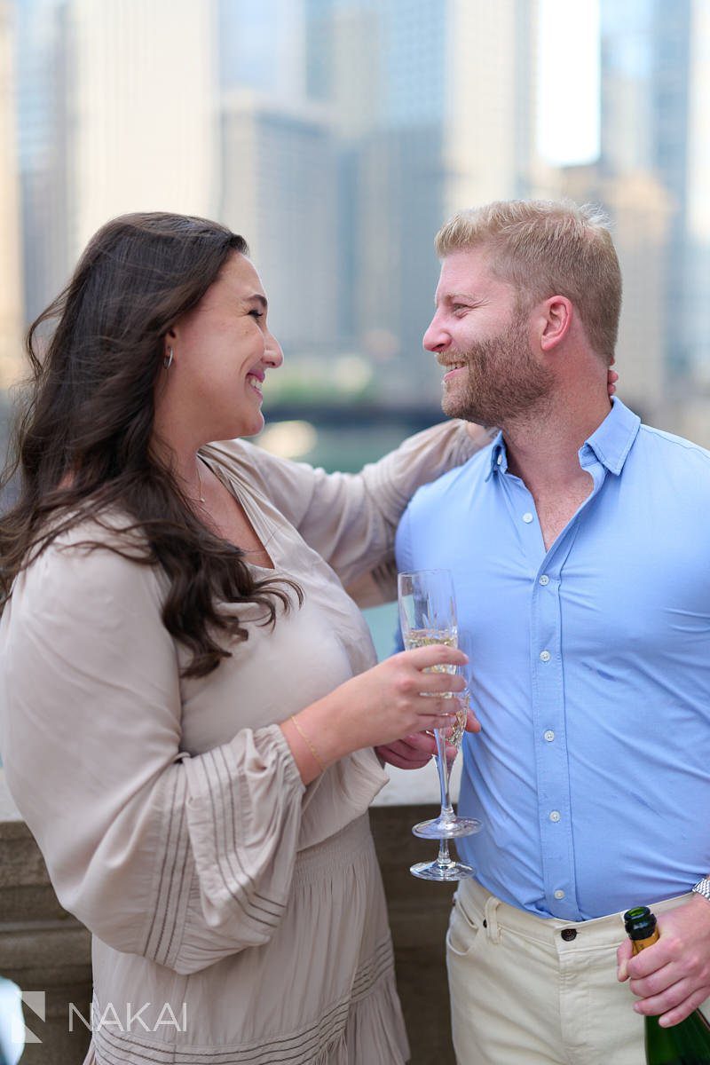 classic chicago engagement photos Wrigley building champagne