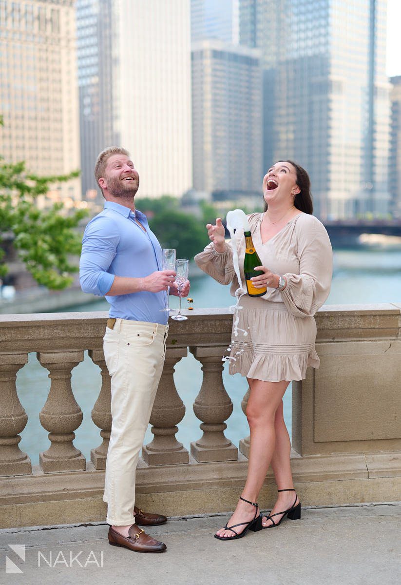 classic chicago engagement photos Wrigley building champagne