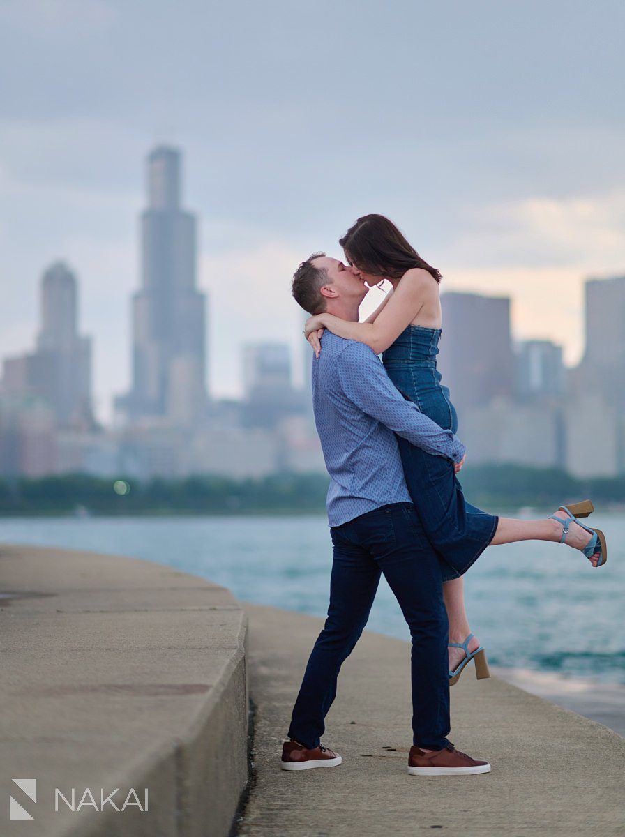 chicago adler planetarium engagement photo kiss skyline background