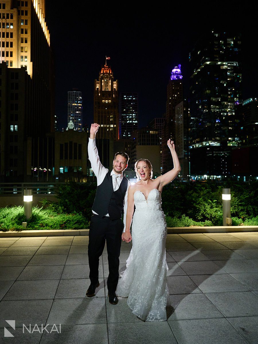 Loews Chicago Wedding pictures rooftop terrace at night bride and groom