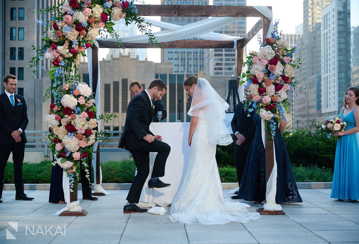 Loews Chicago Wedding pictures rooftop ceremony on terrace under chuppah
