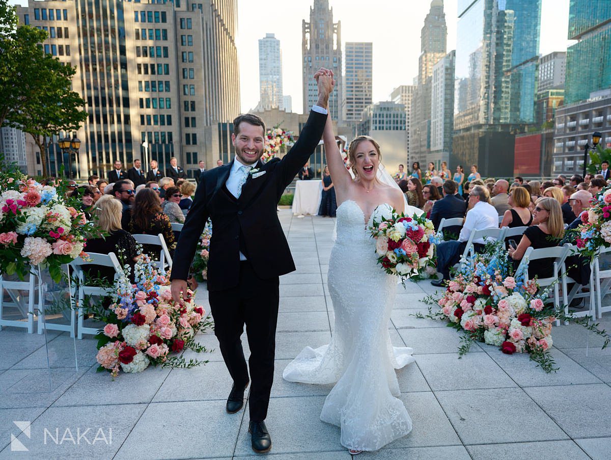 Loews Chicago Wedding pictures rooftop ceremony on terrace exit
