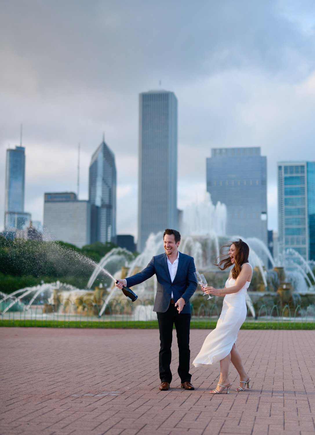 Buckingham Fountain engagement photos chicago champagne spray