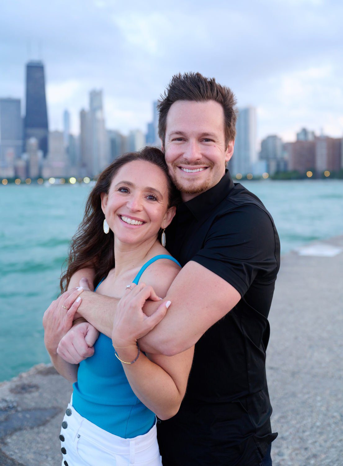 North Avenue Beach engagement photos chicago couple engaged smiling