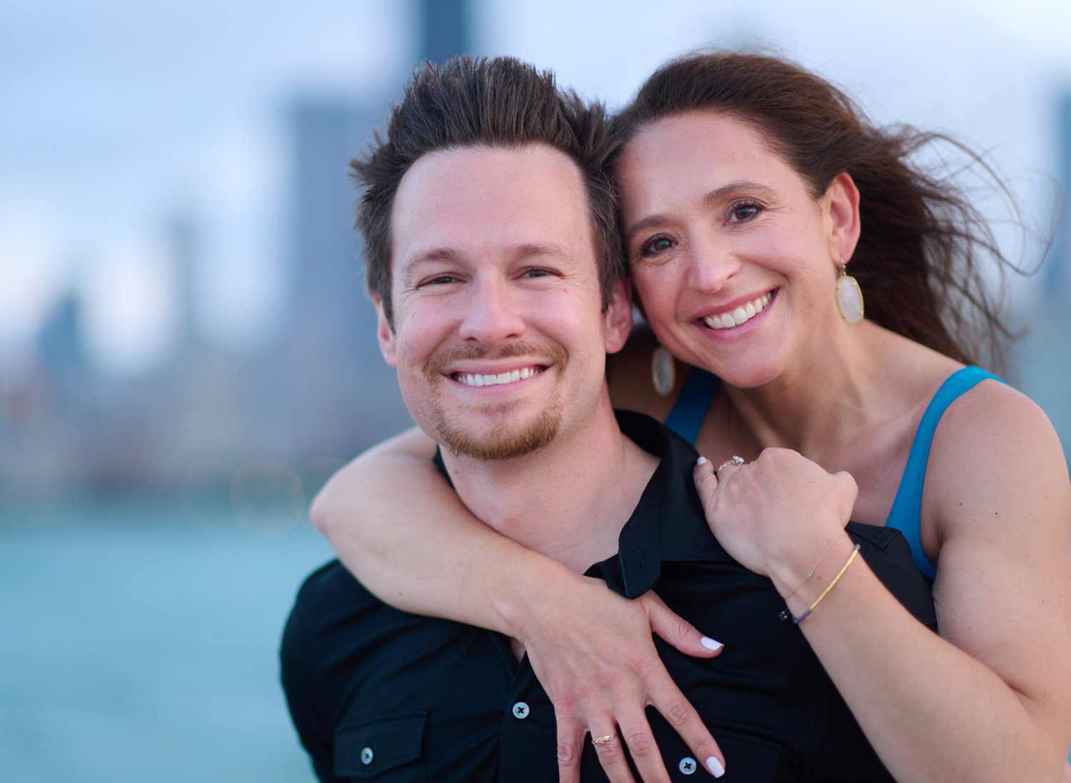 North Avenue Beach engagement photos chicago couple engaged smiling