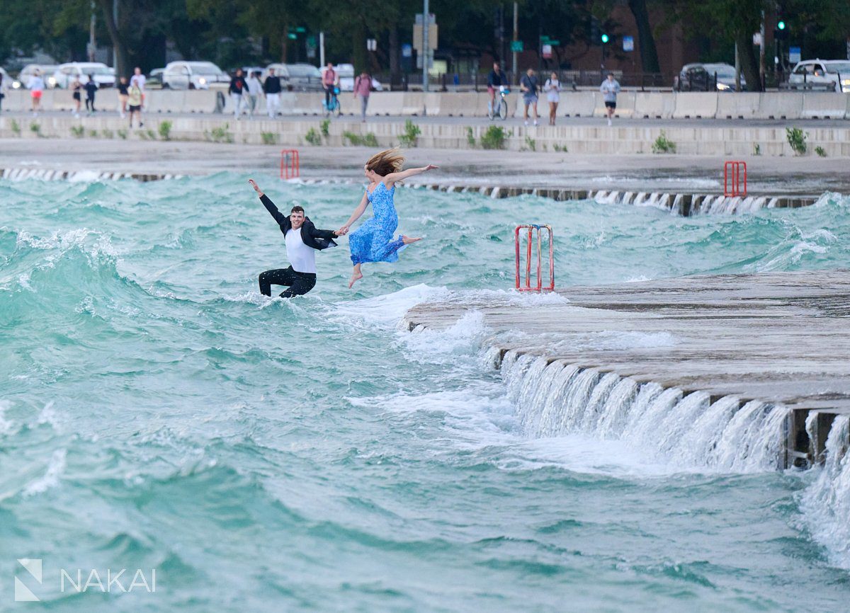 chicago north ave engagement photos jumping off pier