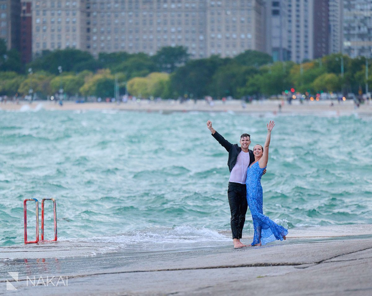 chicago north ave engagement photos jumping off pier