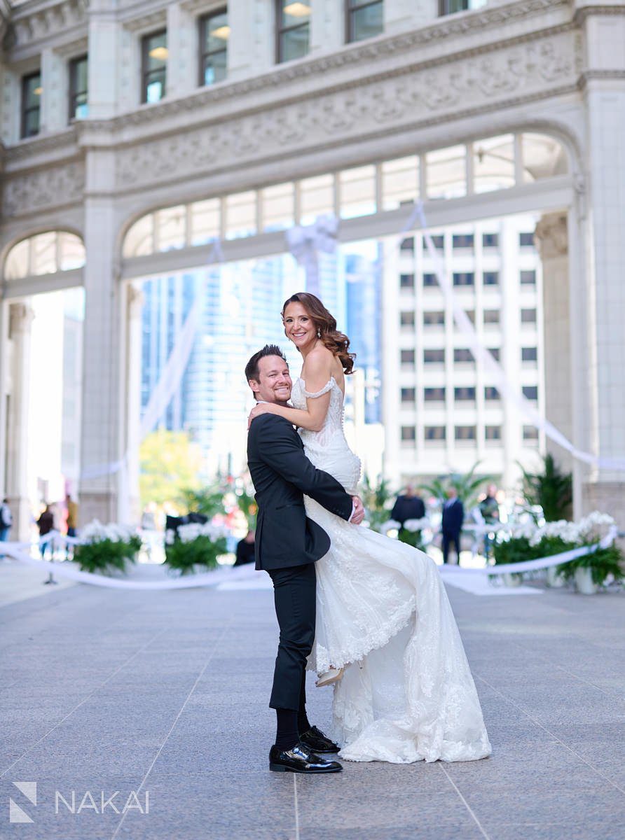 chicago londonhouse wedding photos wrigley building bride lifted up