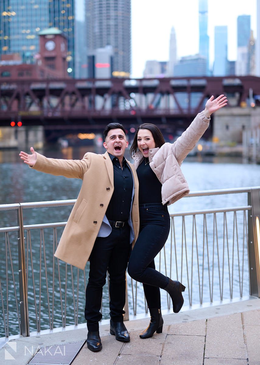 winter Chicago proposal photos riverwalk cheering