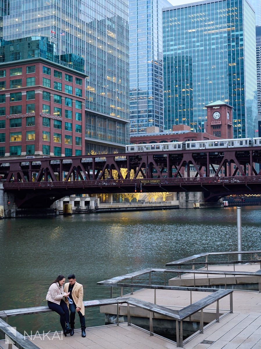 winter Chicago proposal photos riverwalk sitting on bench
