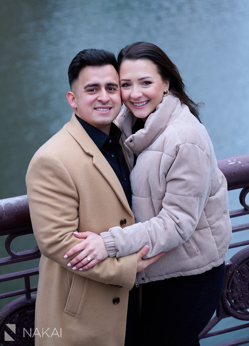 winter Chicago riverwalk proposal photos standing on bridge