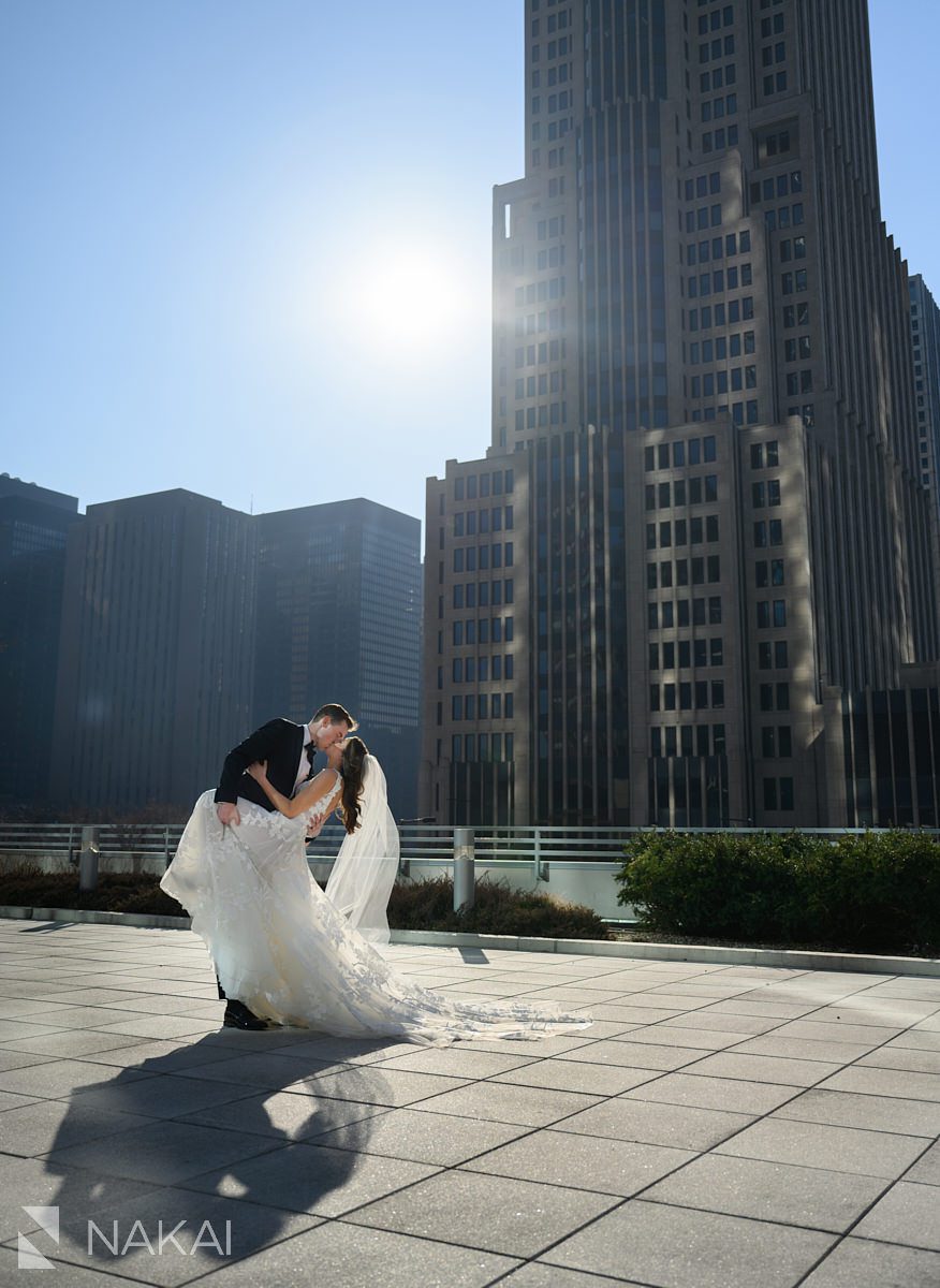 Loews Chicago Hotel wedding pictures rooftop bride groom dip kiss