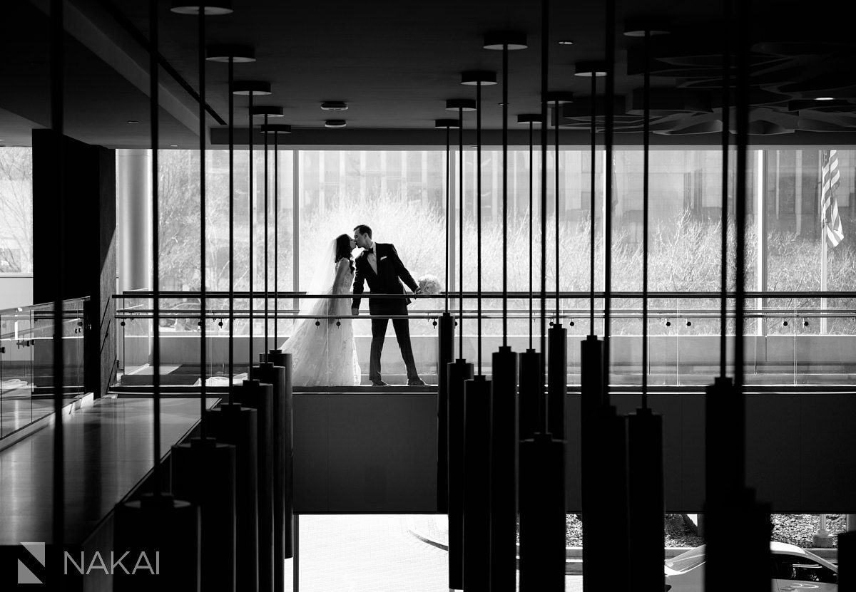 Loews Chicago Hotel wedding pictures lobby bride groom kiss