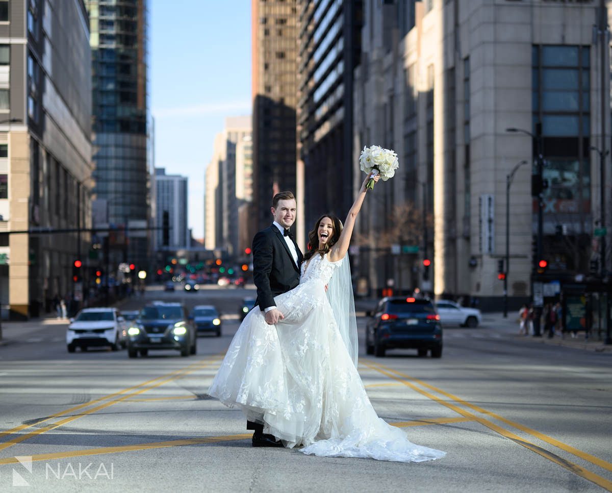 Loews Chicago Hotel wedding pictures bride groom cheer Columbus Dr