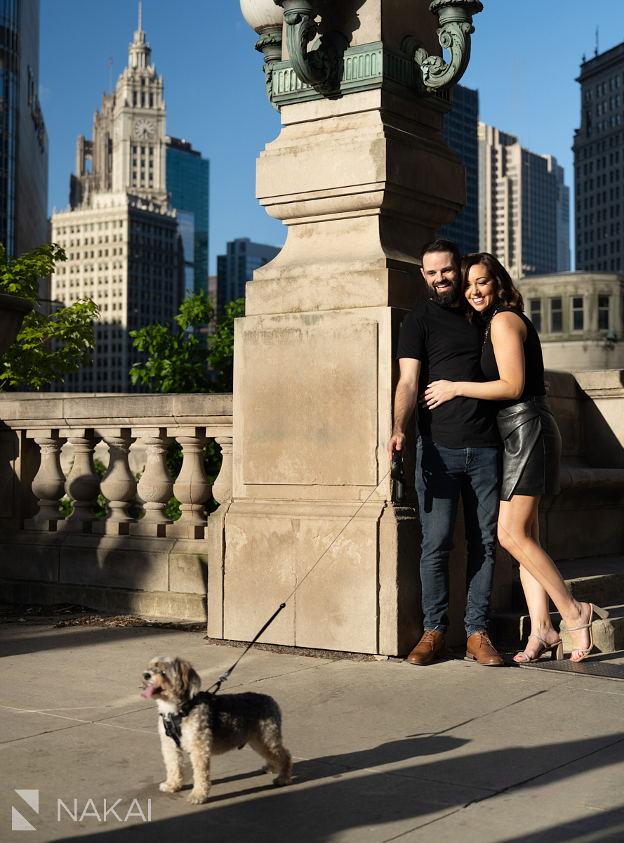 Engagement photo shoot chicago laughing their dog on a leash
