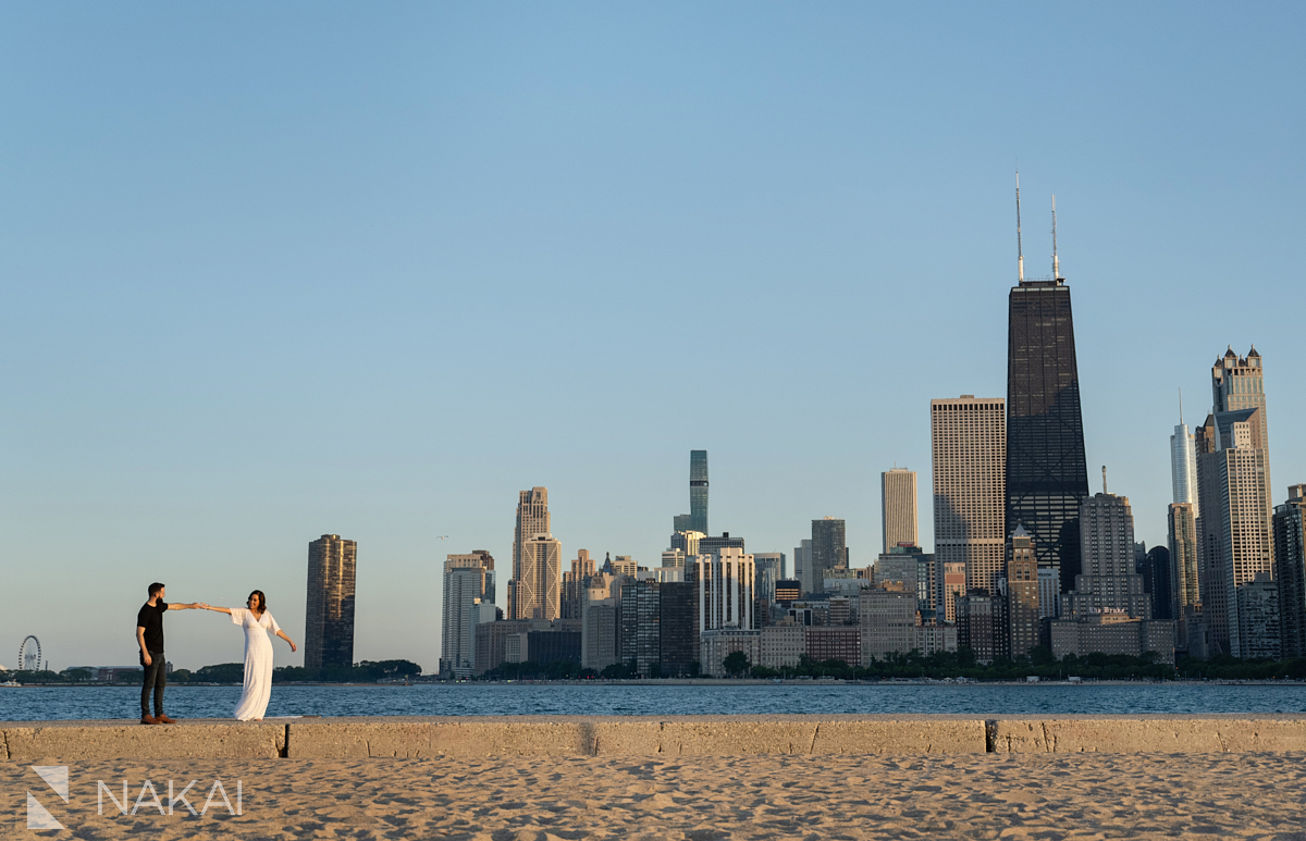 Engagement photo shoot chicago north avenue beach skyline 