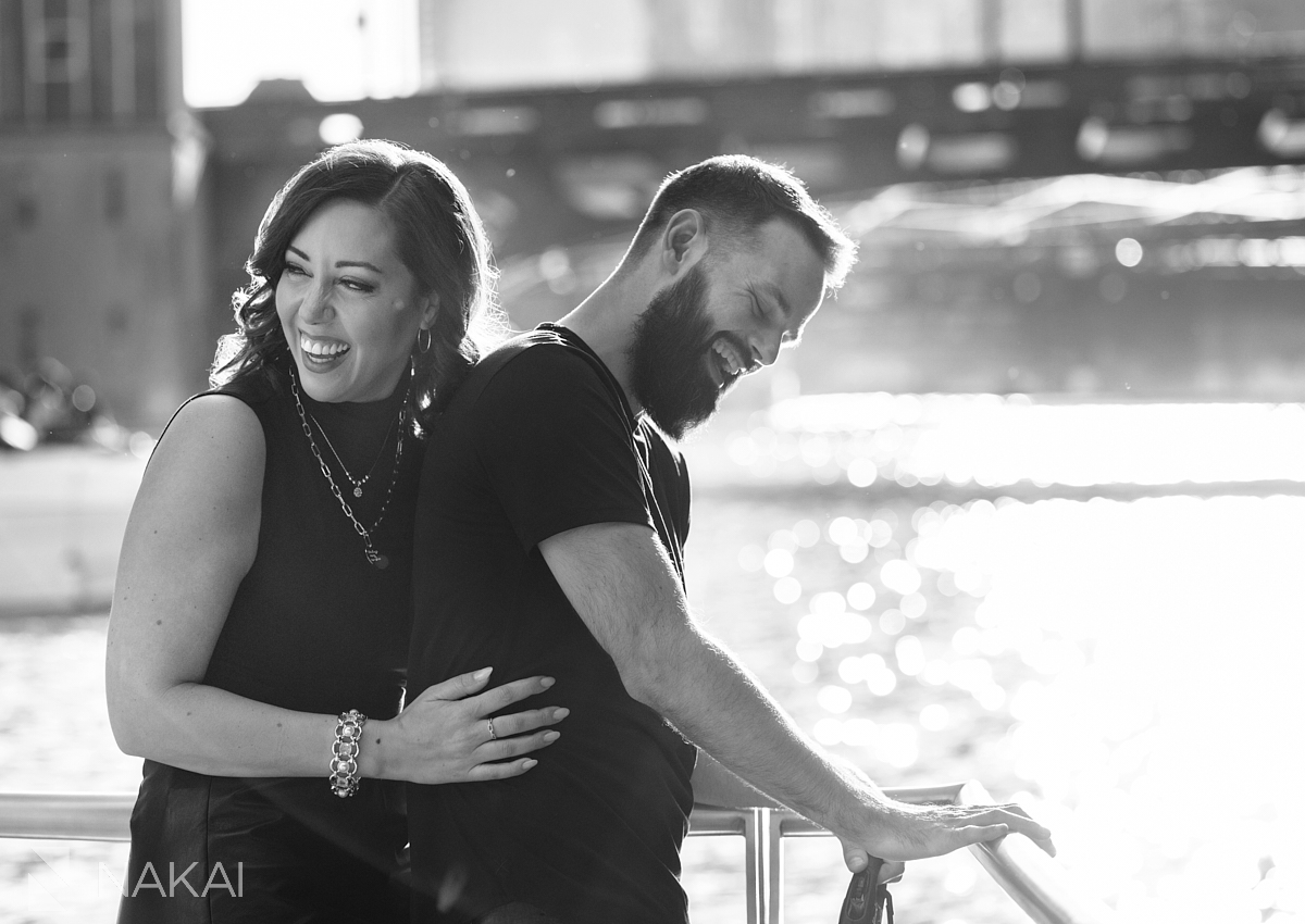 Engagement photo shoot chicago riverwalk laughing black and white