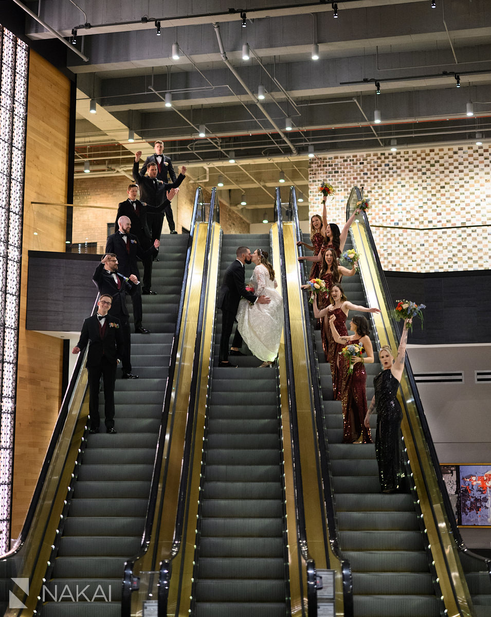 old post office chicago wedding photo bridal party on escalator