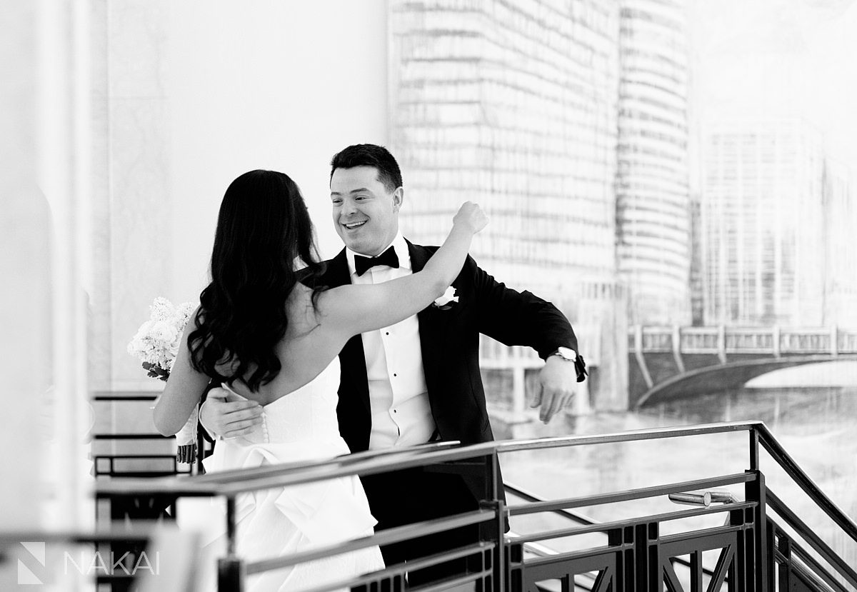 first look for JW Marriott Chicago wedding on staircase