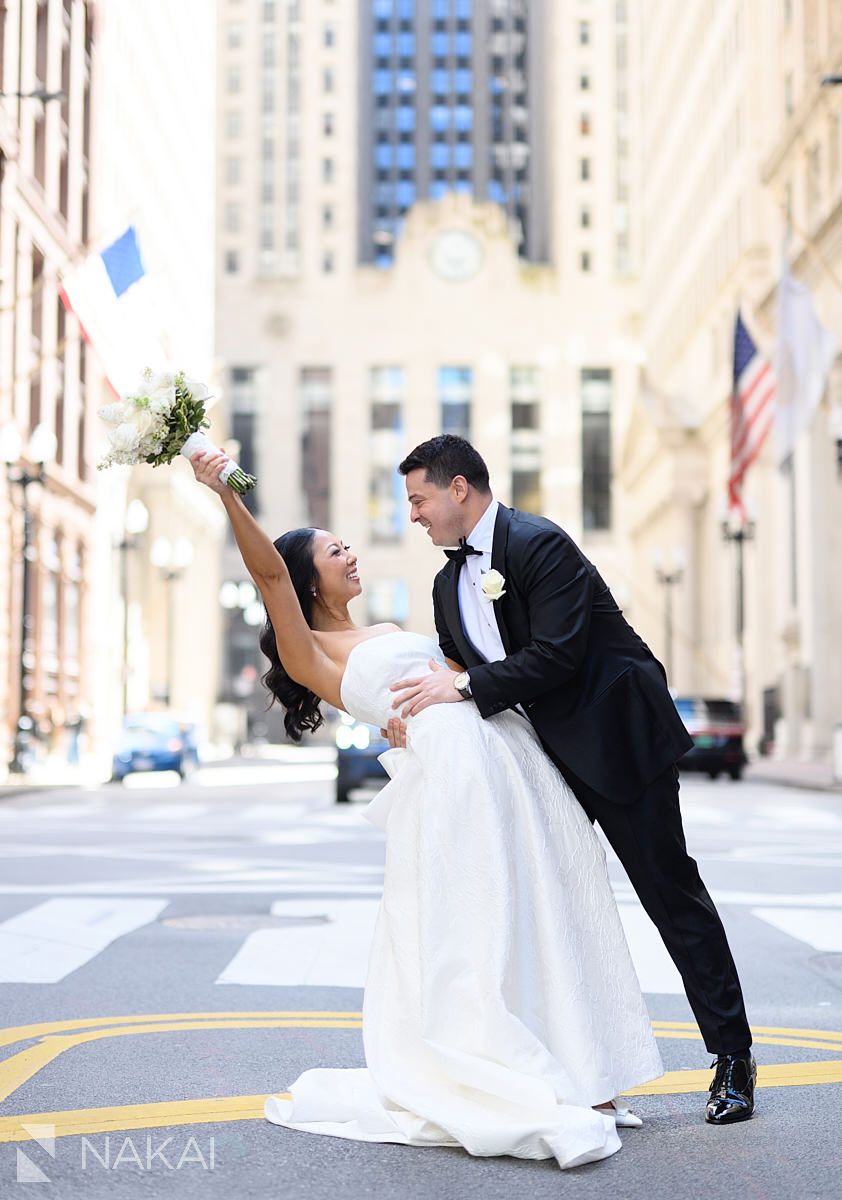 bride and groom dip Chicago LaSalle St wedding photos