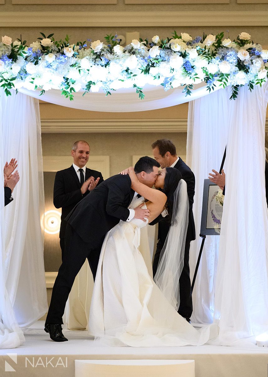 chuppah JW marriott chicago wedding photos couples kiss