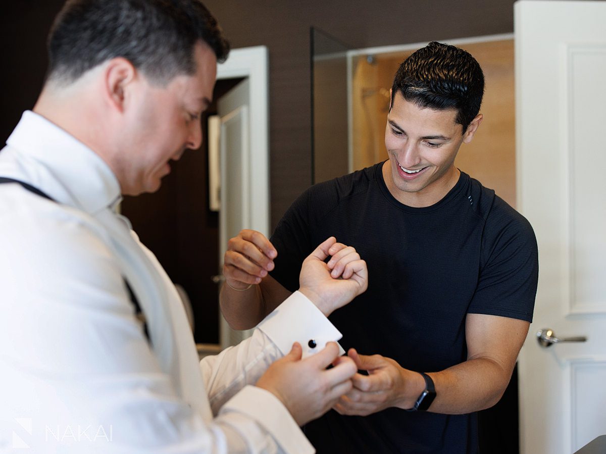 best man helping groom with cufflinks for JW Marriott Chicago wedding
