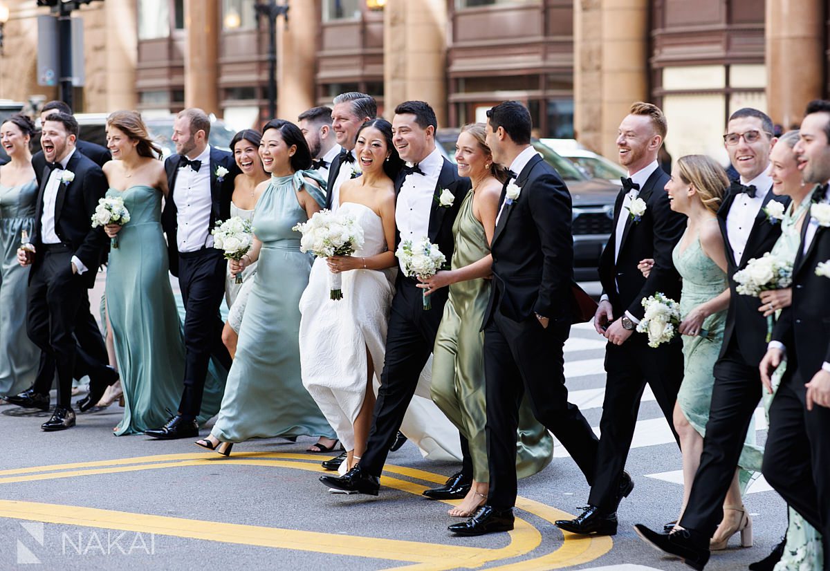 bridal party laughing LaSalle St chicago wedding pictures 