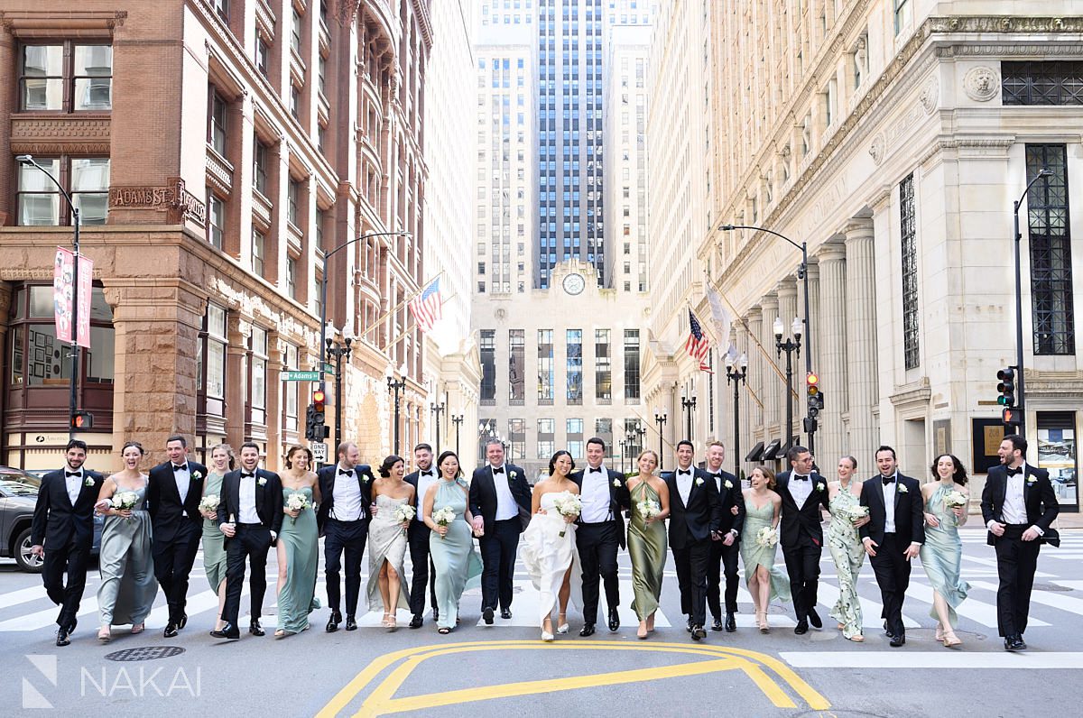LaSalle Street chicago wedding pictures bridal party walking