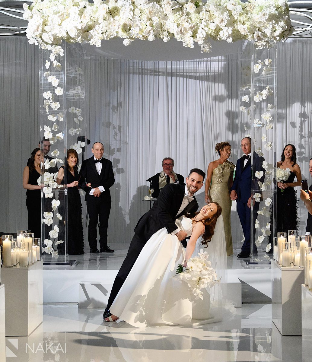 Four Seasons Hotel Chicago wedding ceremony dip kiss down aisle