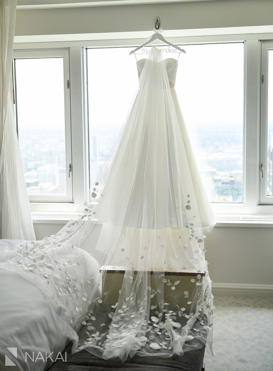 details Four Seasons Hotel Chicago Wedding photo gown dress hanging in window
