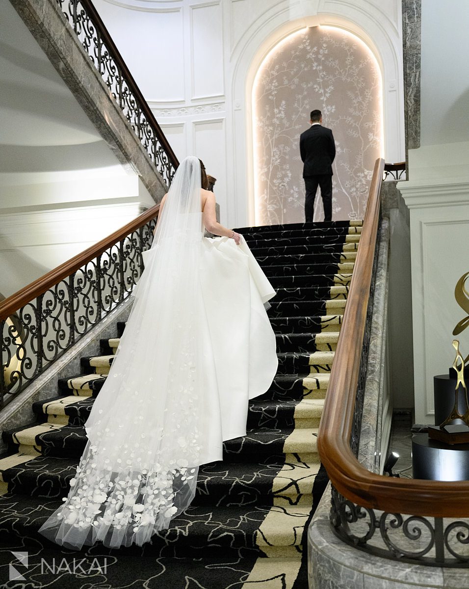 bride groom on staircase Four Seasons Hotel Chicago Wedding photo 