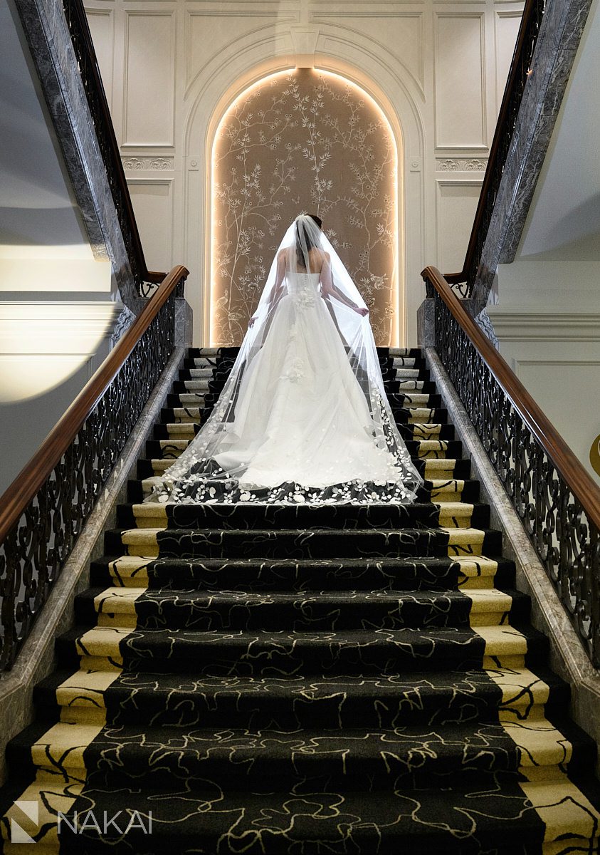 bride on staircase Four Seasons Hotel Chicago Wedding photo