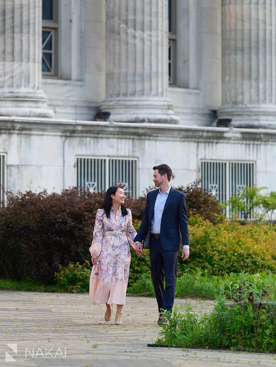 chicago museum campus engagement photos walking in garden with columns