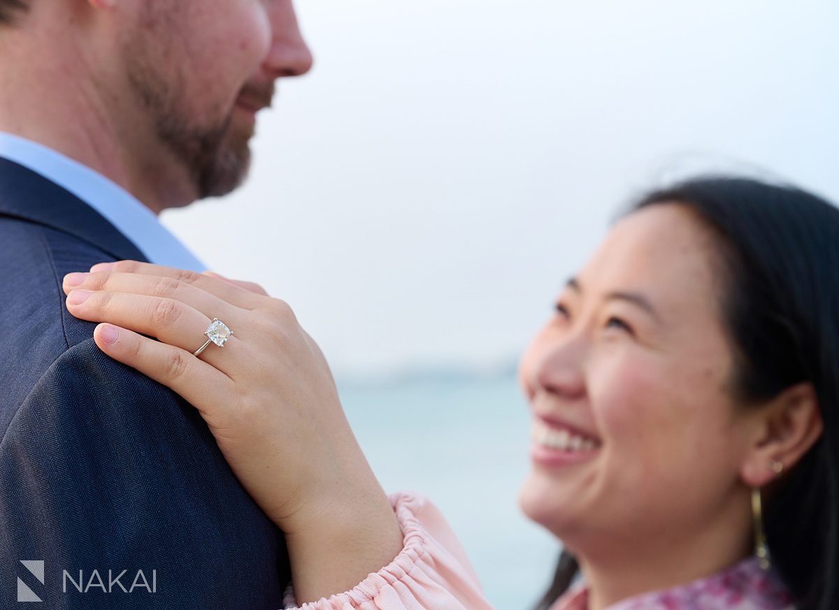 romantic museum campus engagement photos close up of her ring