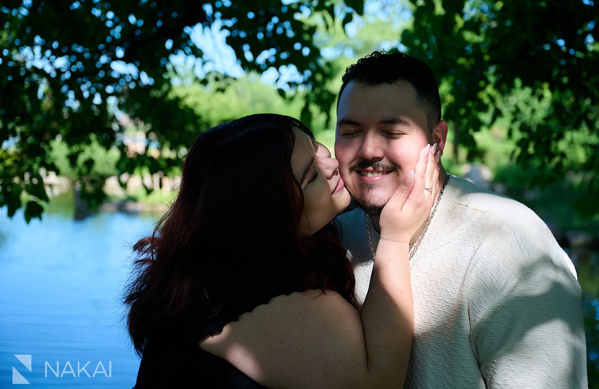 garden of phoenix engagement photo close up of kiss in Chicago's Hyde Park